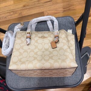 Coach Beige Signature Satchel. sig mollie